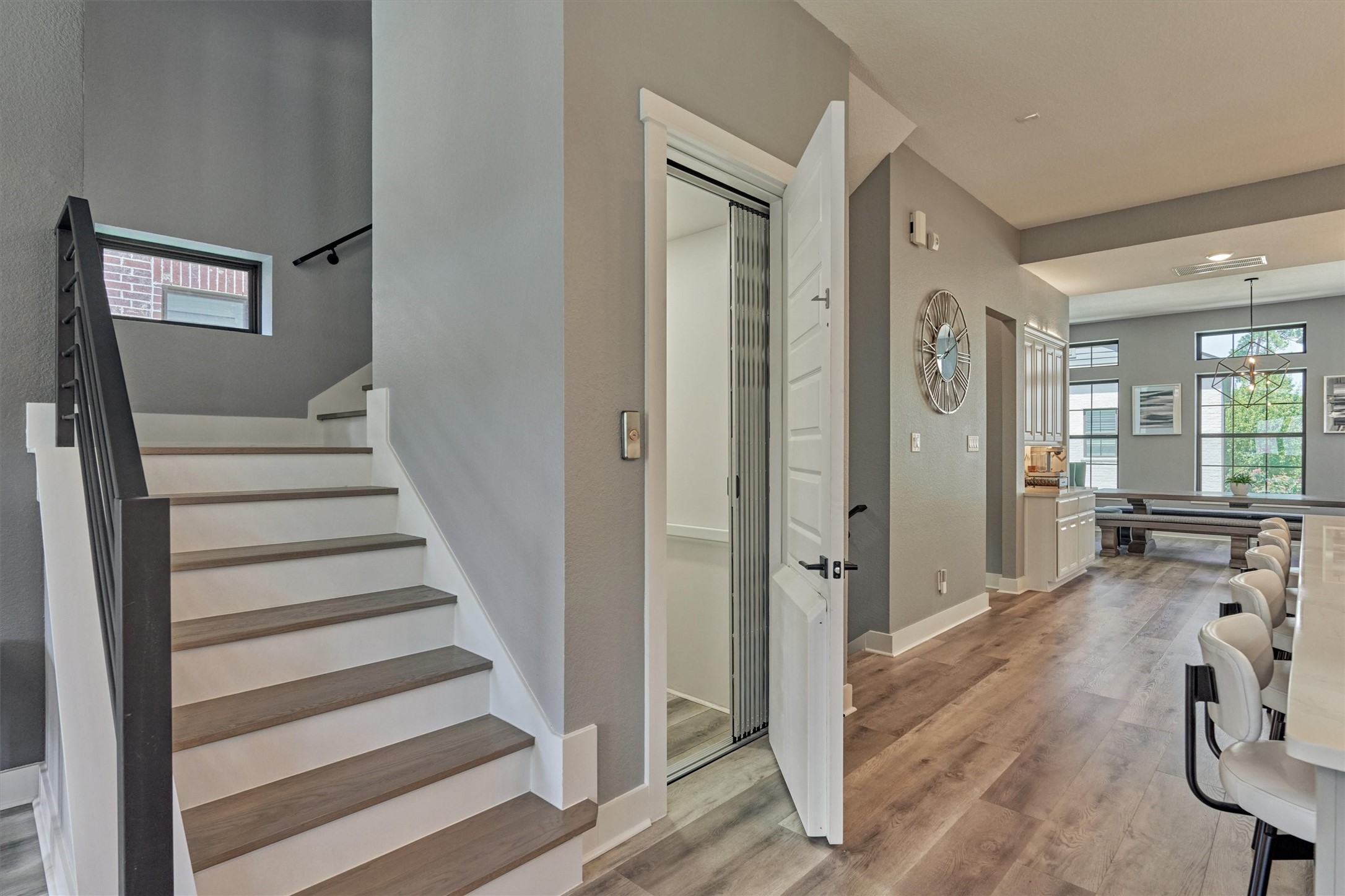 35 Amerson Bay Way Spring, TX 77380 - Photo 17 of 50 The second floor with elevator door access. The current owners also upgraded and customized the stairwell with modern ironwork railing and baulster and solid oak flooring steps.