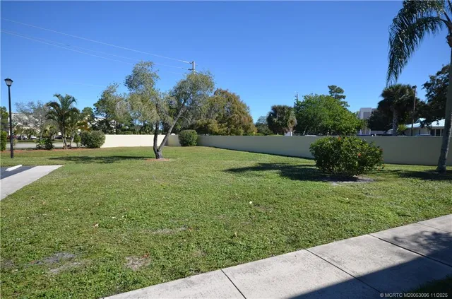 a view of a garden with a bench