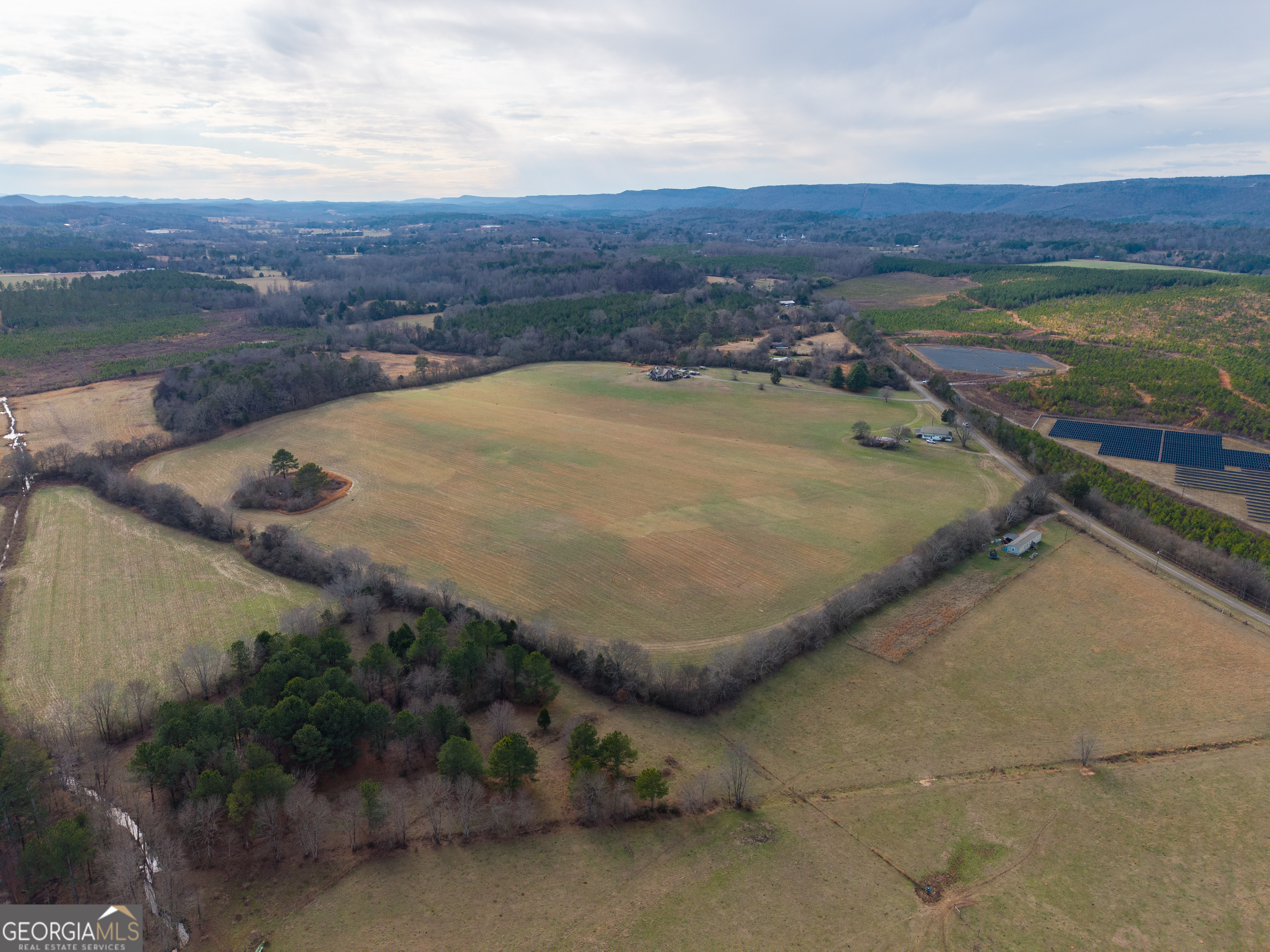 0 Old Highway 337 Menlo, GA 30731 - Photo 26 of 42 a view of a swimming pool with a yard and mountain view