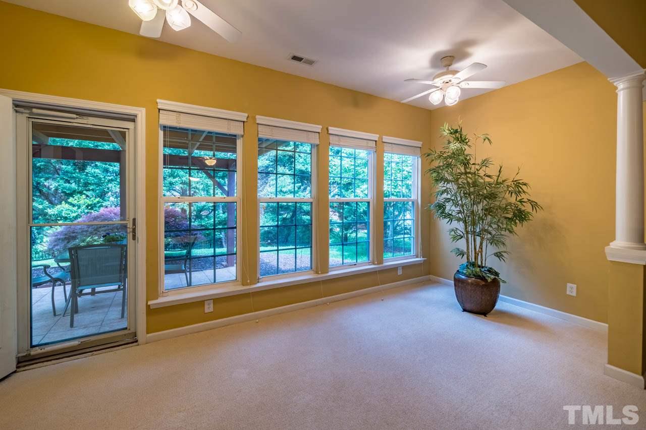 3400 Cathedral Bell Road Raleigh, NC 27614 - Photo 13 of 26 a view of empty room with floor to ceiling window and front door