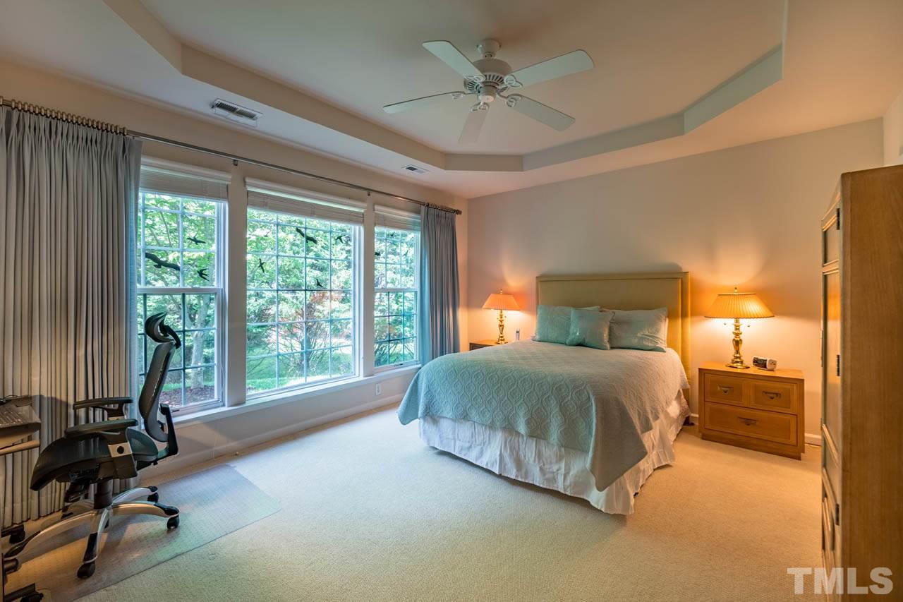3400 Cathedral Bell Road Raleigh, NC 27614 - Photo 14 of 26 a bedroom with a bed and a large window