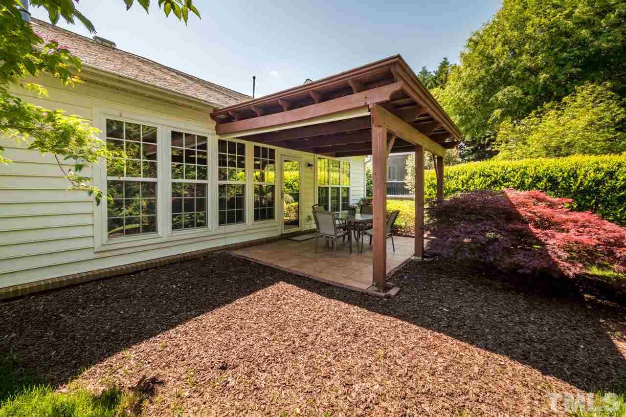 3400 Cathedral Bell Road Raleigh, NC 27614 - Photo 23 of 26 a view of a backyard with sitting area