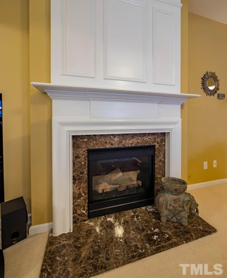 3400 Cathedral Bell Road Raleigh, NC 27614 - Photo 7 of 26 a living room with a fireplace