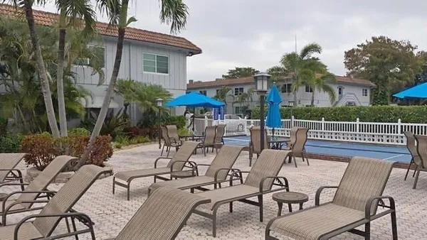a view of a patio with furniture
