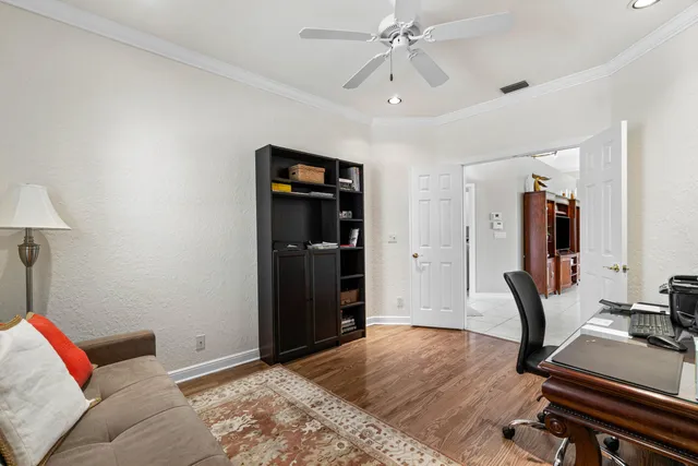 a bedroom with furniture and a window