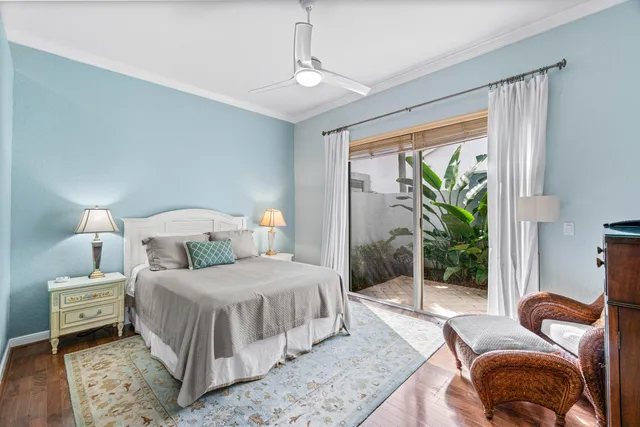 a bedroom with a bed and a couch