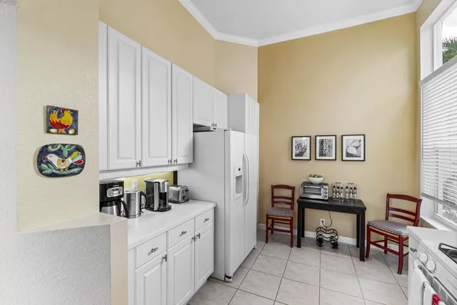 a view of kitchen with furniture and window