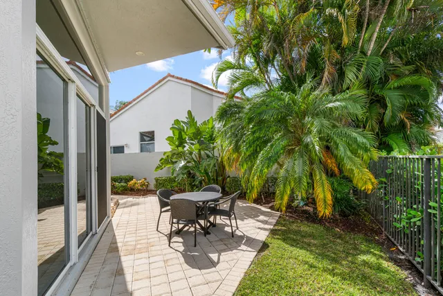 a view of outdoor sitting area with furniture