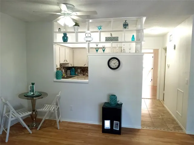 a white refrigerator freezer sitting in a kitchen