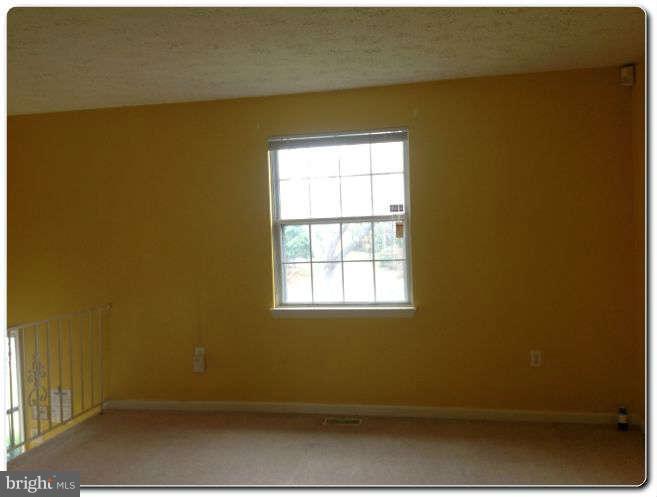 3303 Randall Road Suitland, MD 20746 - Photo 2 of 8 a view of a room that has a window