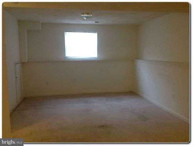 3303 Randall Road Suitland, MD 20746 - Photo 4 of 8 an empty room with a window