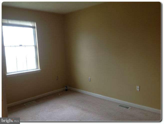 3303 Randall Road Suitland, MD 20746 - Photo 6 of 8 an empty room with a window