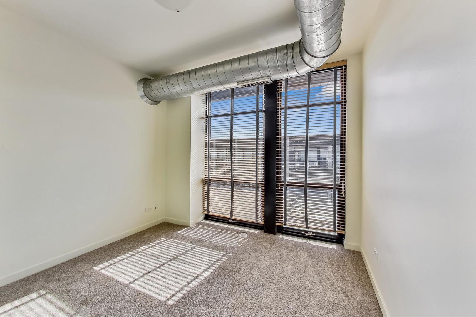 1151 West 14th Place, Unit 404 Chicago, IL 60608 - Photo 14 of 28 a view of an empty room