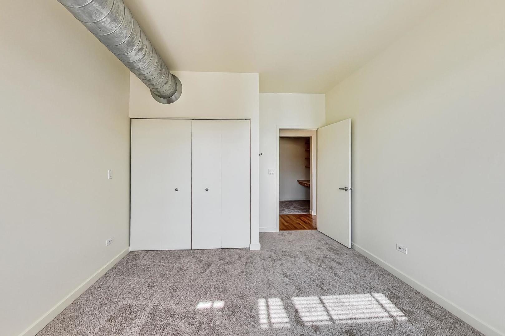 1151 West 14th Place, Unit 404 Chicago, IL 60608 - Photo 15 of 28 a view of an empty room