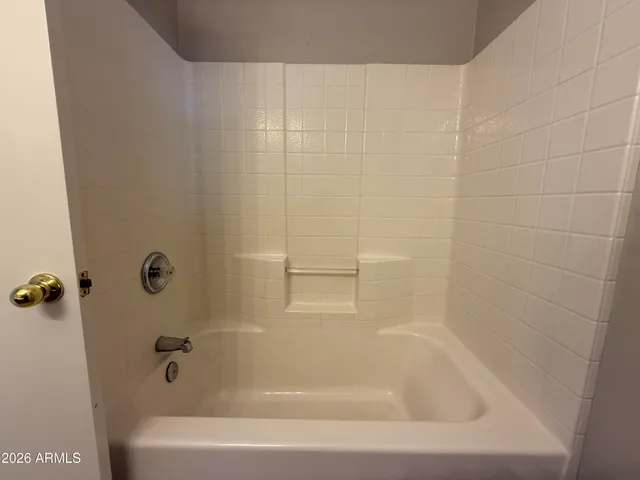 a close up of a bathtub in a bathroom