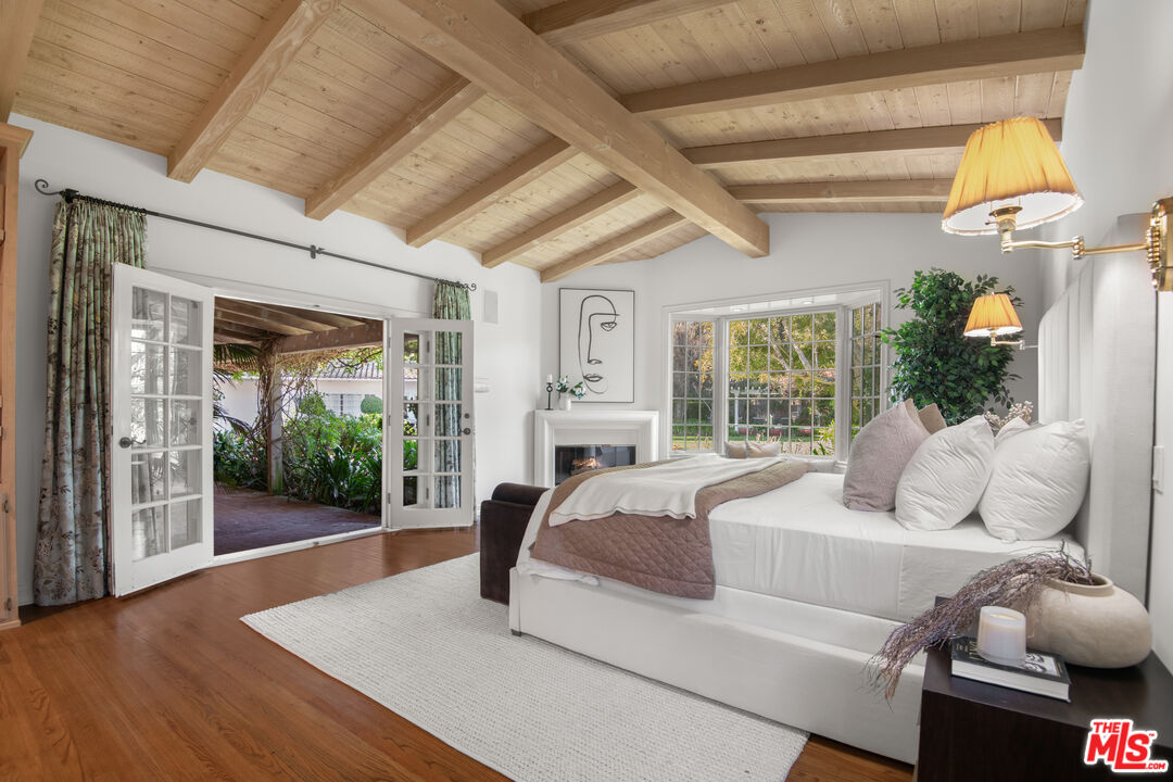 6105 Bonsall Drive Malibu, CA 90265 - Photo 16 of 45 a bed room with a bed and a window