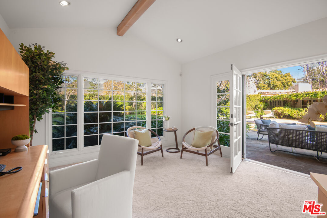 6105 Bonsall Drive Malibu, CA 90265 - Photo 30 of 45 a balcony with furniture and a potted plant