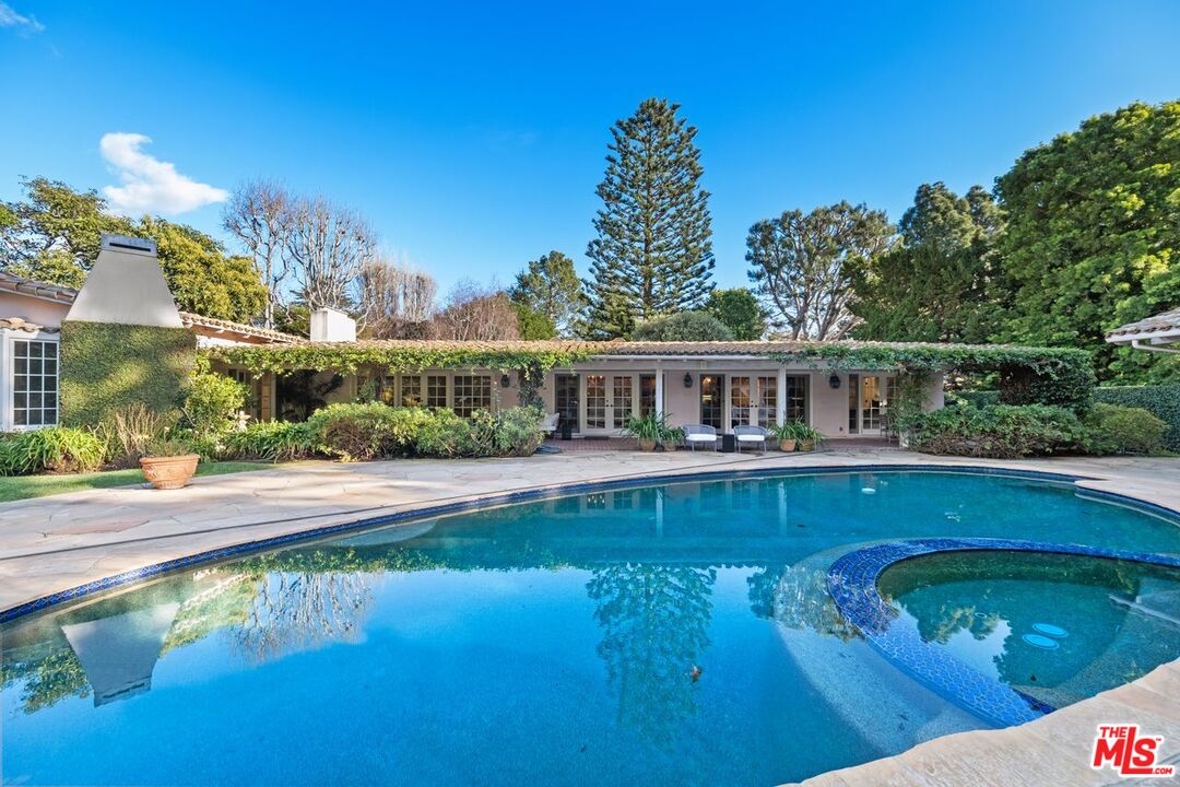 6105 Bonsall Drive Malibu, CA 90265 - Photo 34 of 45 a view of a swimming pool with a patio
