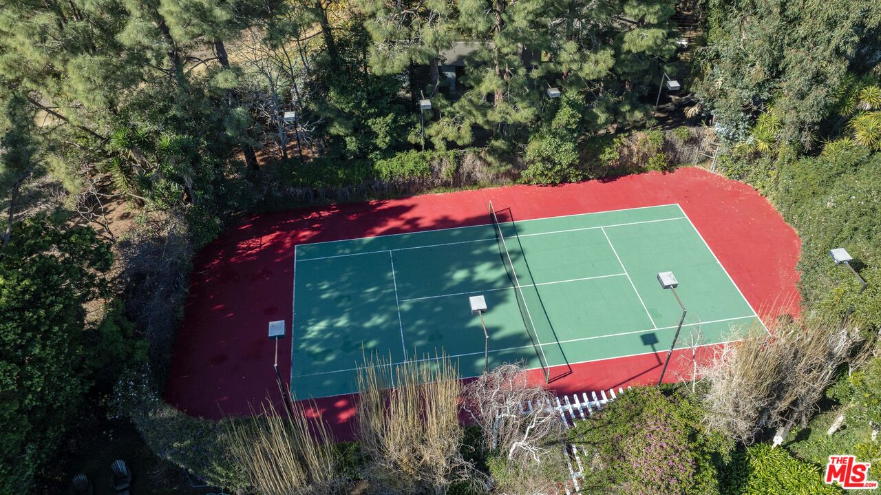 6105 Bonsall Drive Malibu, CA 90265 - Photo 37 of 45 an outdoor space with seating area and garden