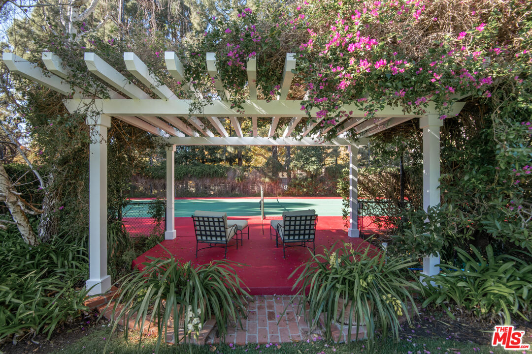 6105 Bonsall Drive Malibu, CA 90265 - Photo 38 of 45 an outdoor space with seating area and yard