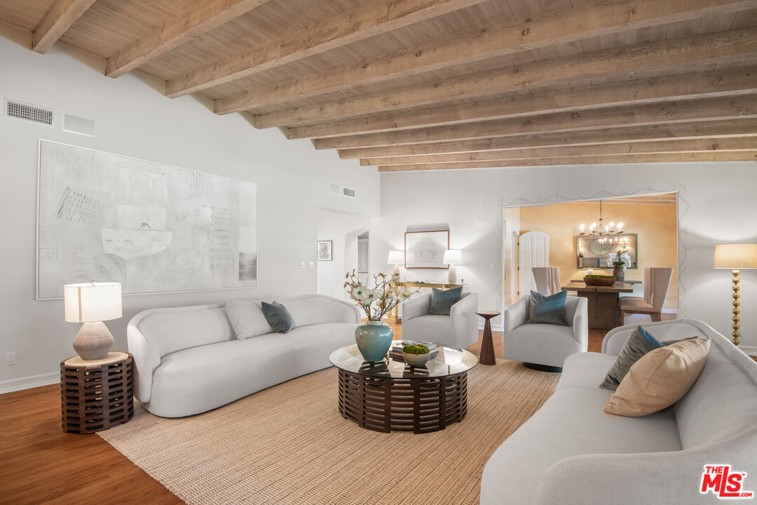 6105 Bonsall Drive Malibu, CA 90265 - Photo 4 of 45 a living room with furniture and a lamp