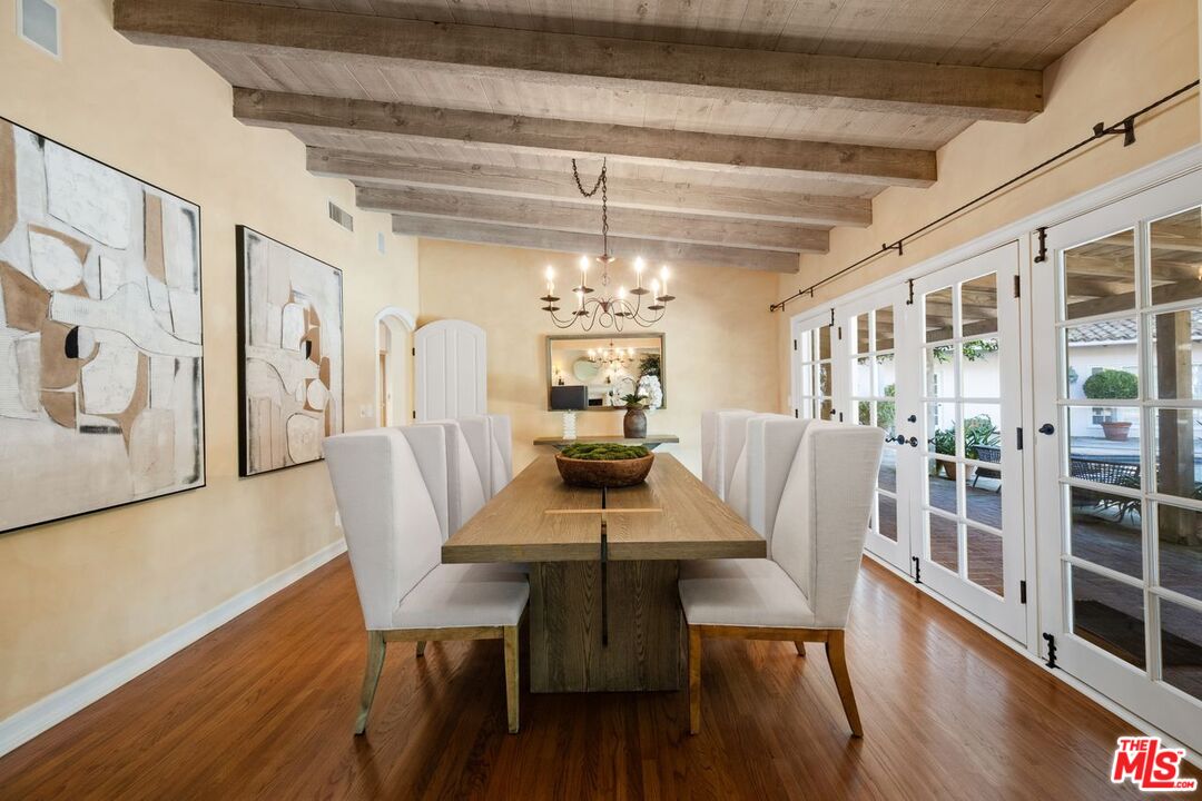 6105 Bonsall Drive Malibu, CA 90265 - Photo 8 of 45 a view of a dining room with furniture window and wooden floor