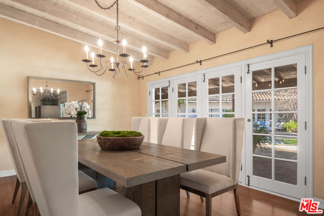 6105 Bonsall Drive Malibu, CA 90265 - Photo 9 of 45 a view of a dining room with furniture and wooden floor