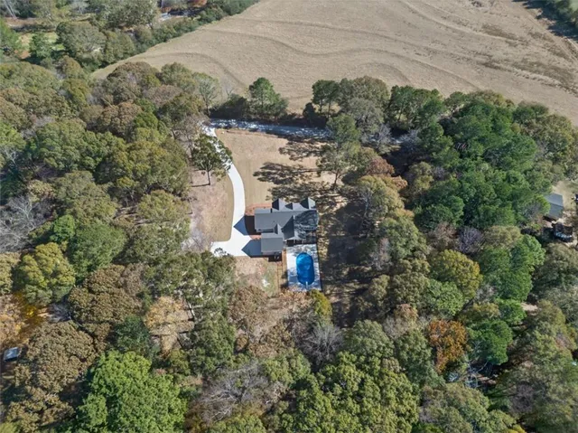 a view of swimming pool with a yard