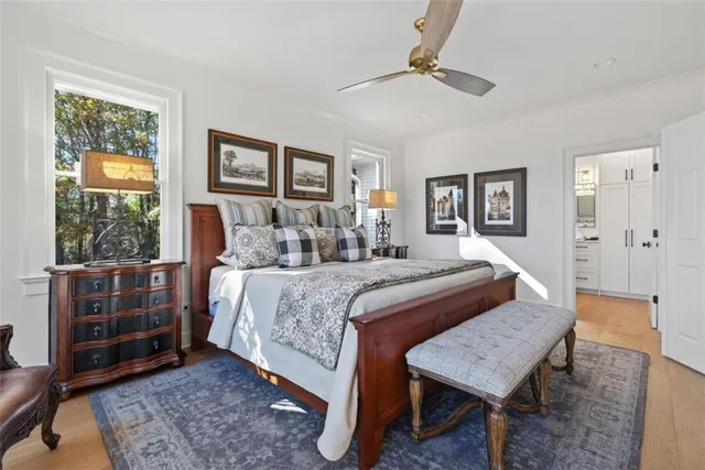 a bedroom with a bed and a table