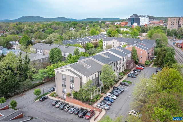 a outdoor space with patio lots of furniture and umbrella