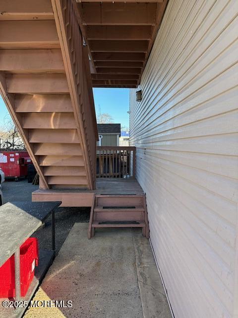 216 Ocean Gate Avenue, Unit 2 Ocean Gate, NJ 08740 - Photo 13 of 17 a view of entryway with wooden stairs