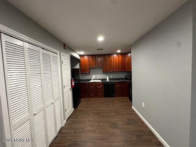 216 Ocean Gate Avenue, Unit 2 Ocean Gate, NJ 08740 - Photo 3 of 17 a view of a kitchen with a stove