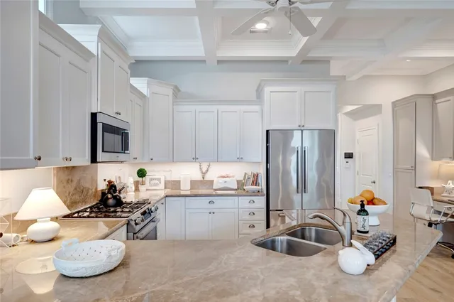 a room with a chair and cabinets