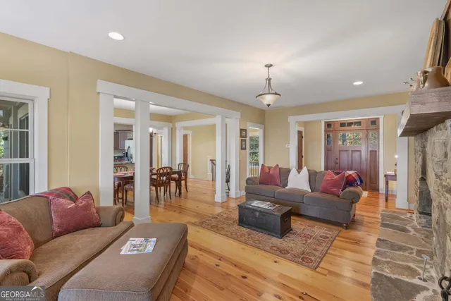 a kitchen with stainless steel appliances granite countertop wooden cabinets a sink and a stove