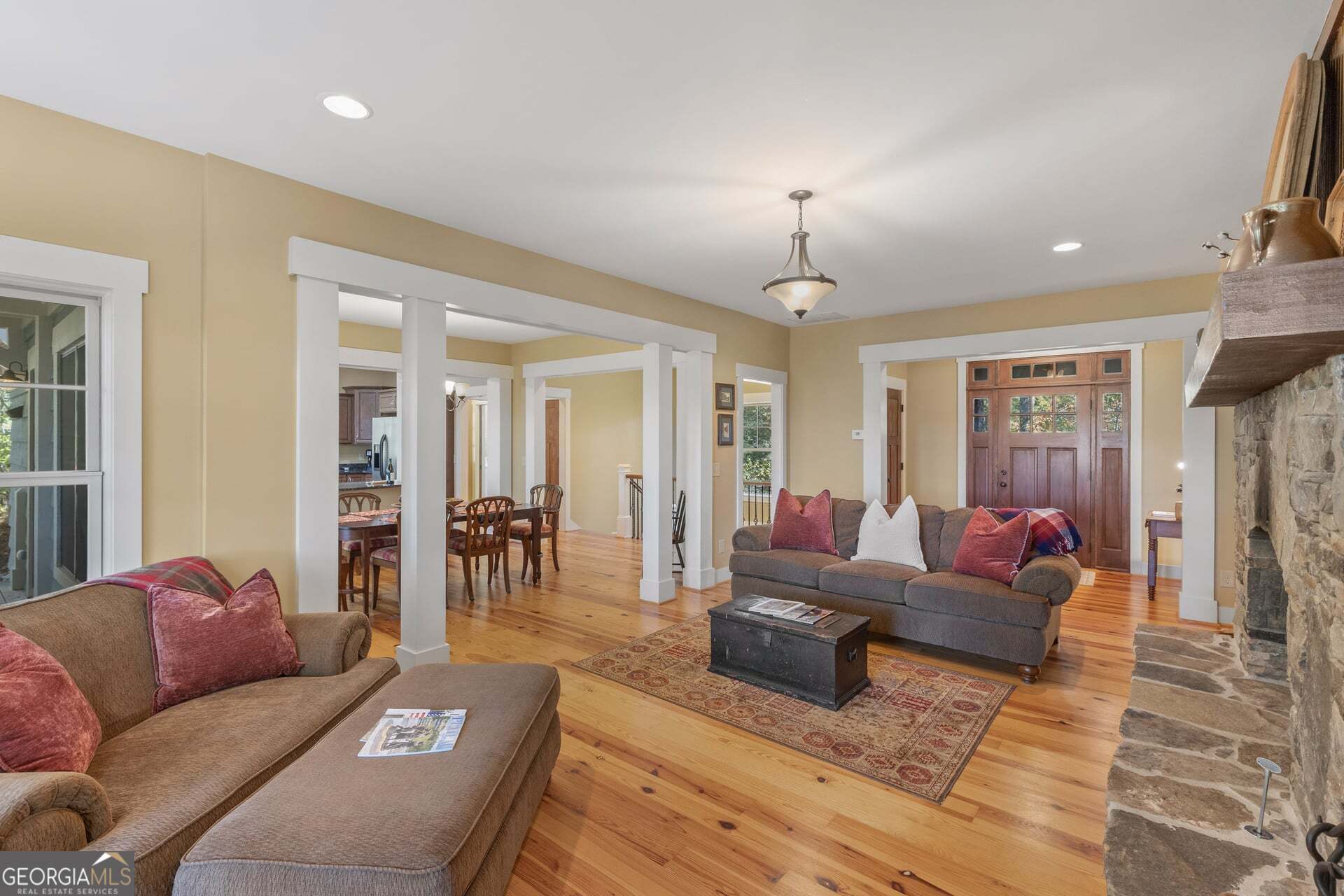 2473 Highland Gap Road Scaly Mountain, NC 28775 - Photo 11 of 93 a living room with furniture and a chandelier