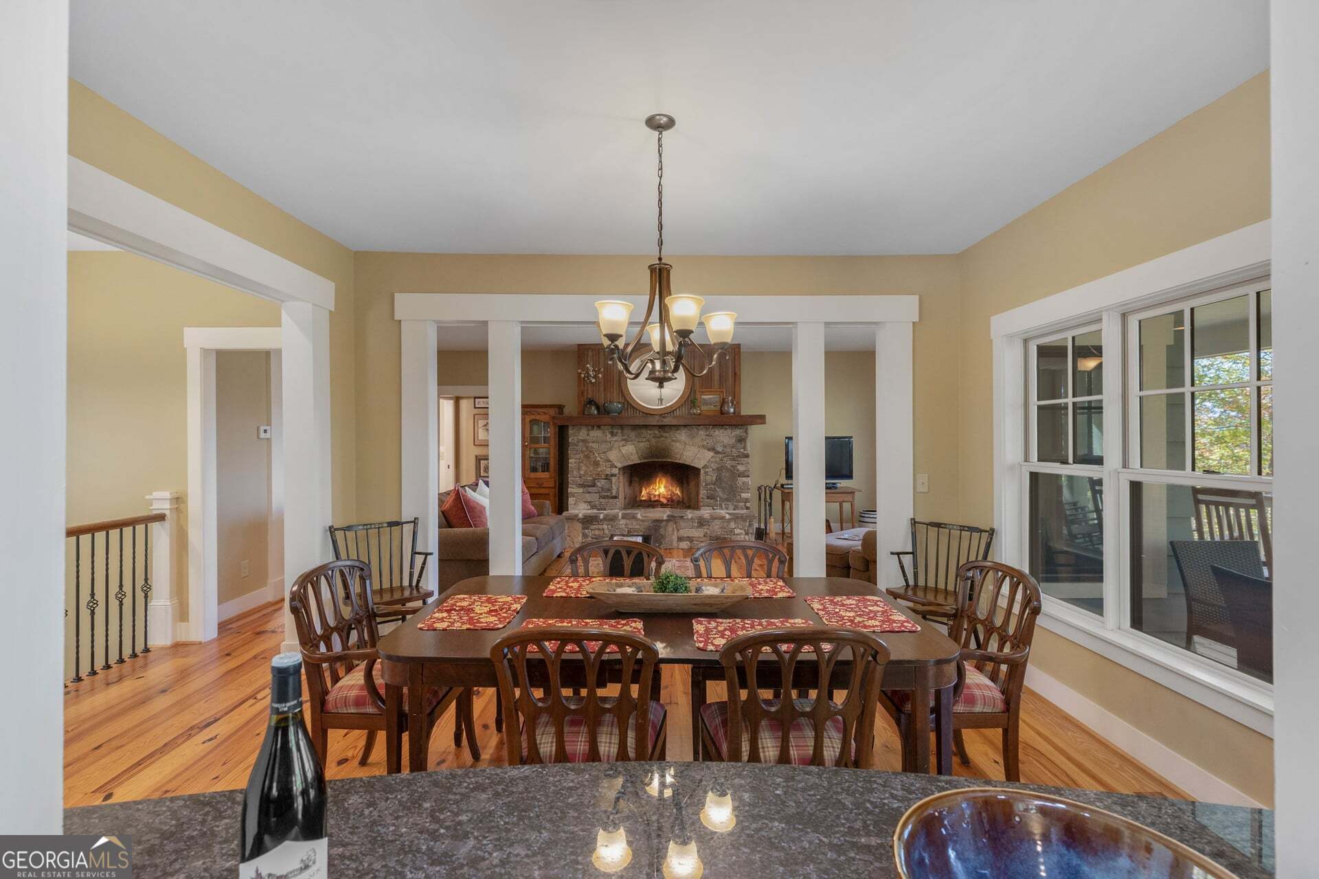 2473 Highland Gap Road Scaly Mountain, NC 28775 - Photo 23 of 93 a dining room with furniture window and wooden floor