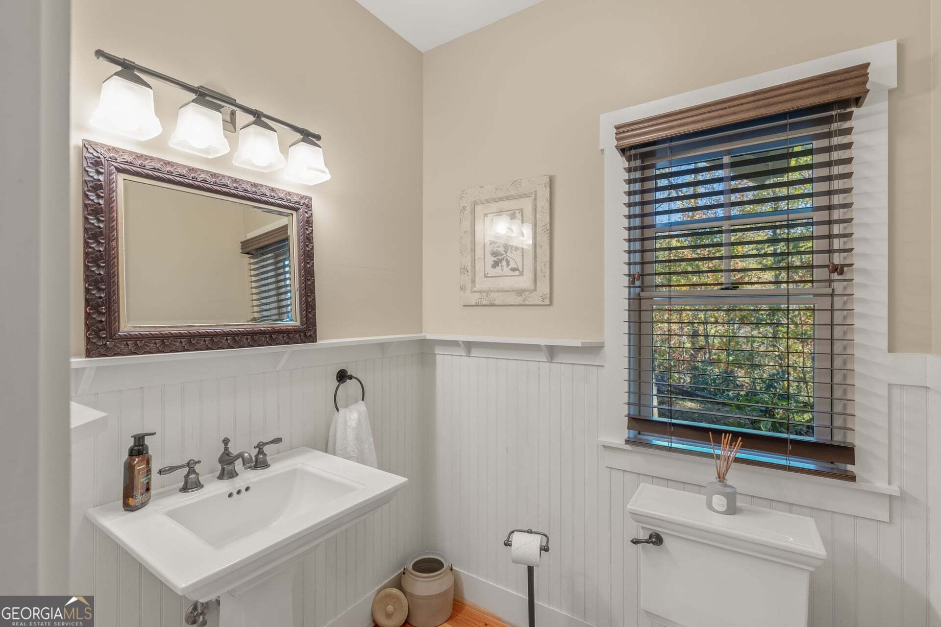 2473 Highland Gap Road Scaly Mountain, NC 28775 - Photo 24 of 93 a bathroom with a sink a vanity and a mirror