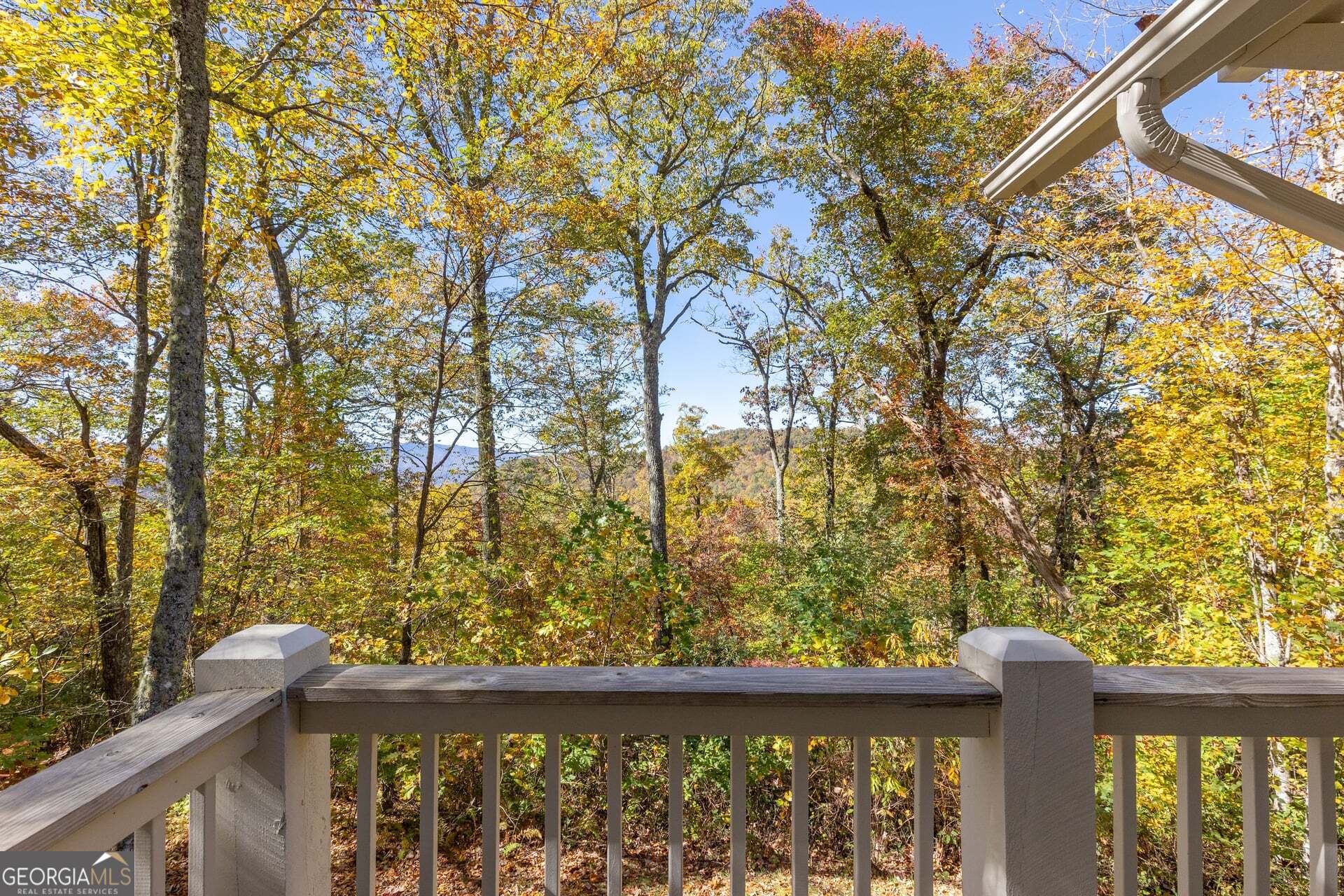 2473 Highland Gap Road Scaly Mountain, NC 28775 - Photo 45 of 93 a view of a wooden fence and trees