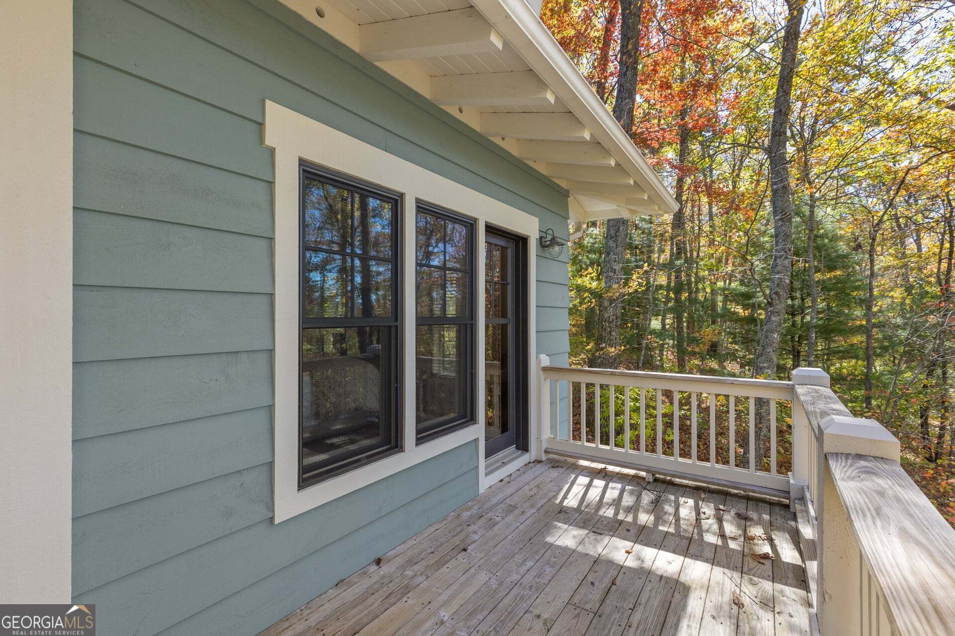 2473 Highland Gap Road Scaly Mountain, NC 28775 - Photo 46 of 93 a view of deck with large trees and wooden floor