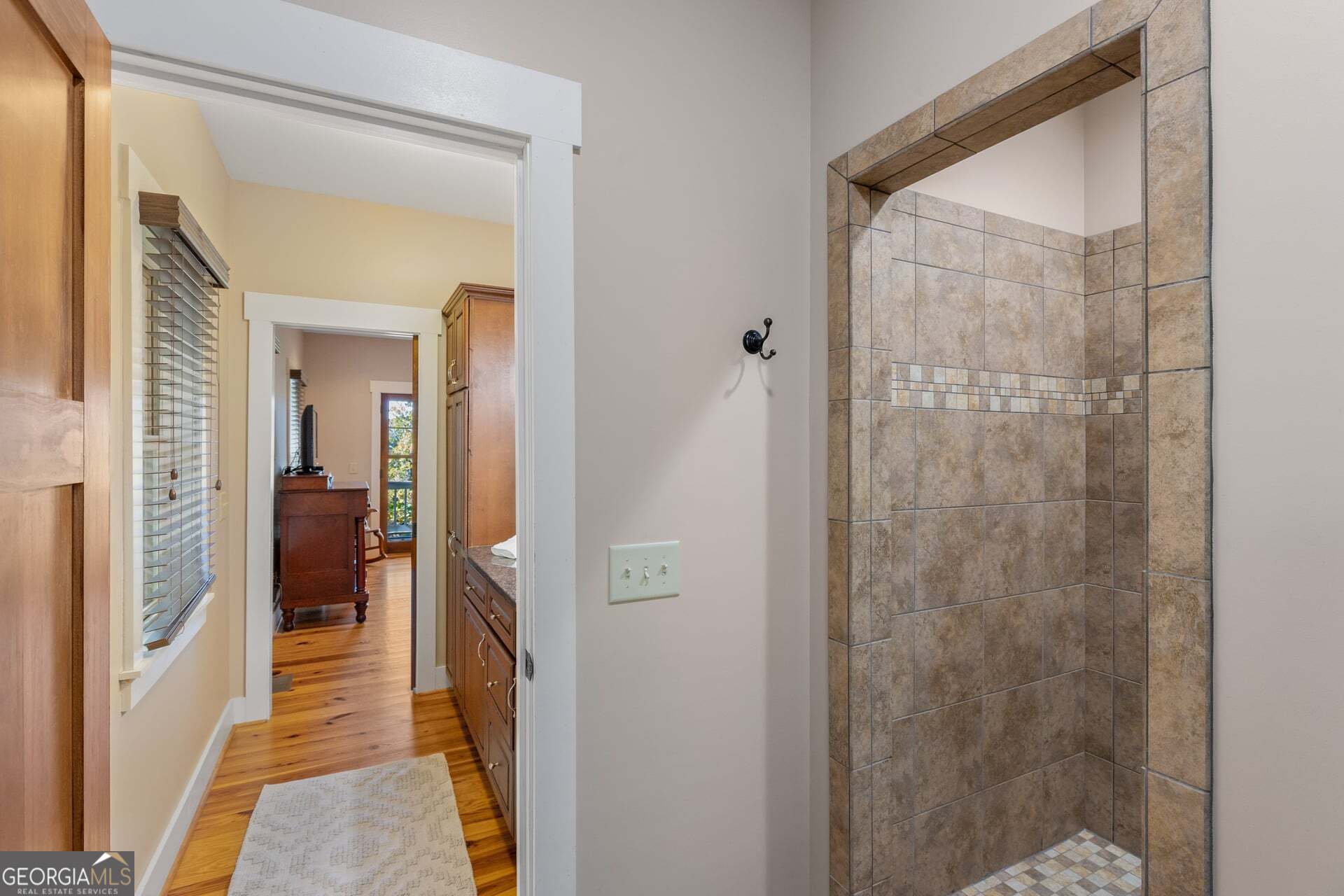 2473 Highland Gap Road Scaly Mountain, NC 28775 - Photo 54 of 93 a view of a bathroom from a hallway