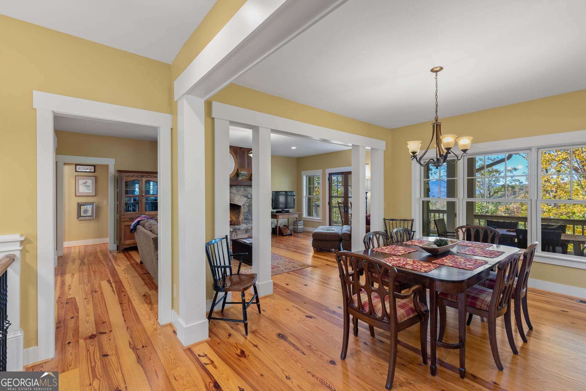 2473 Highland Gap Road Scaly Mountain, NC 28775 - Photo 55 of 93 a view of a dining room with furniture window and wooden floor