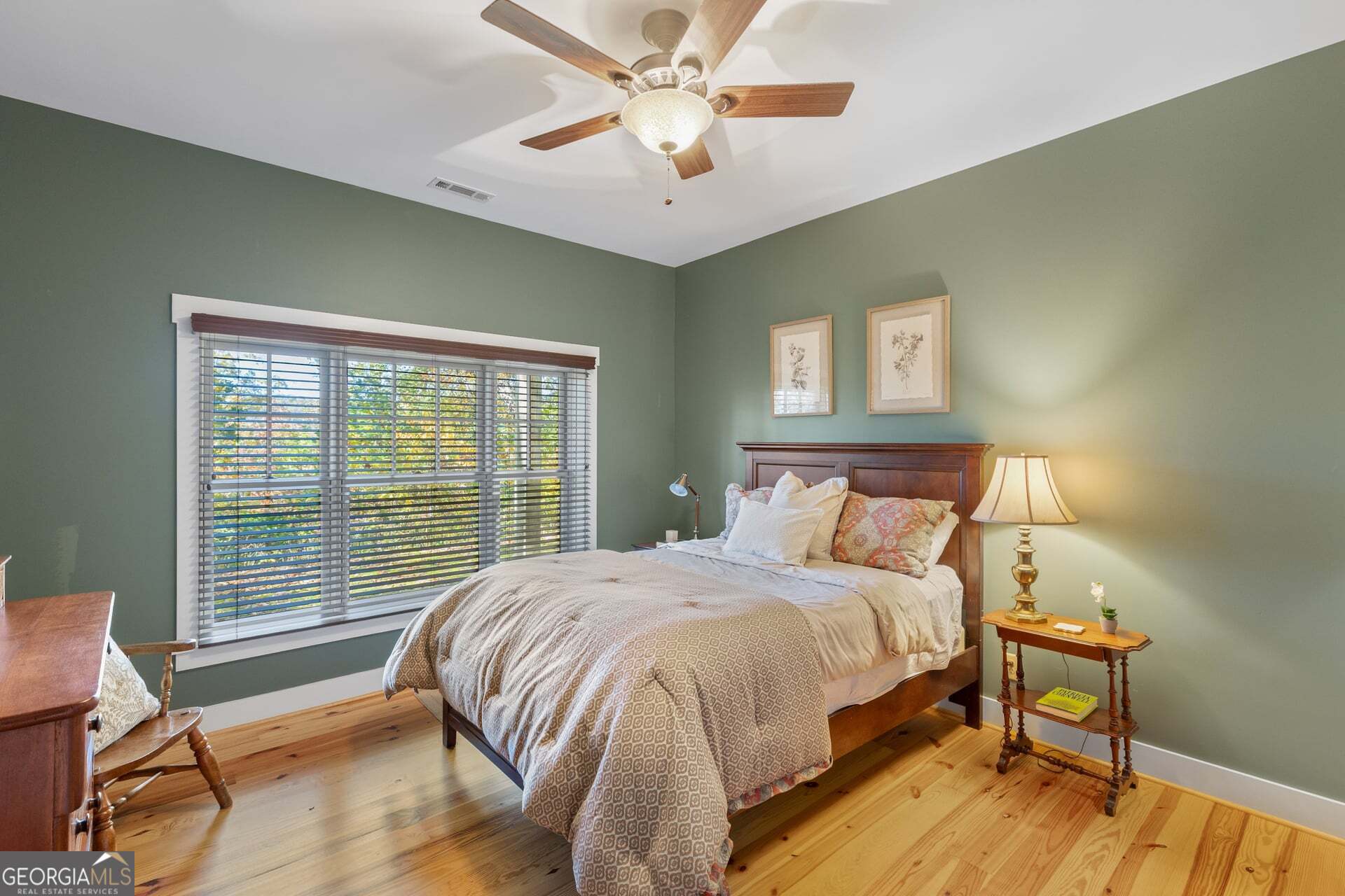 2473 Highland Gap Road Scaly Mountain, NC 28775 - Photo 69 of 93 a bed sitting in a bedroom next to a window