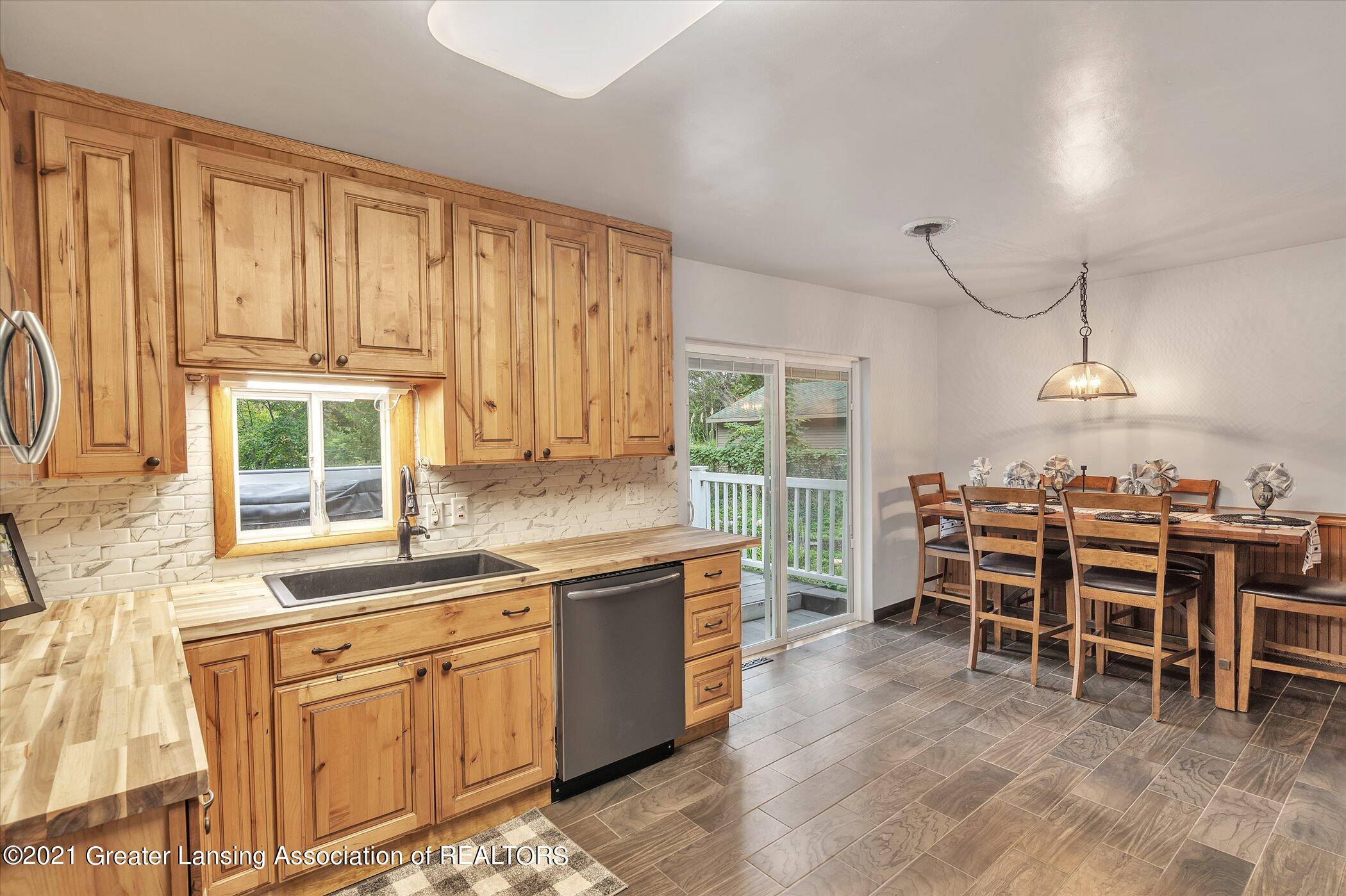 2821 North Aurelius Road Lansing, MI 48910 - Photo 13 of 48 13-2821 Aurelius Rd-Windowstill-Real-Est