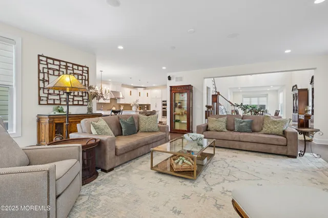 a living room with furniture and a table