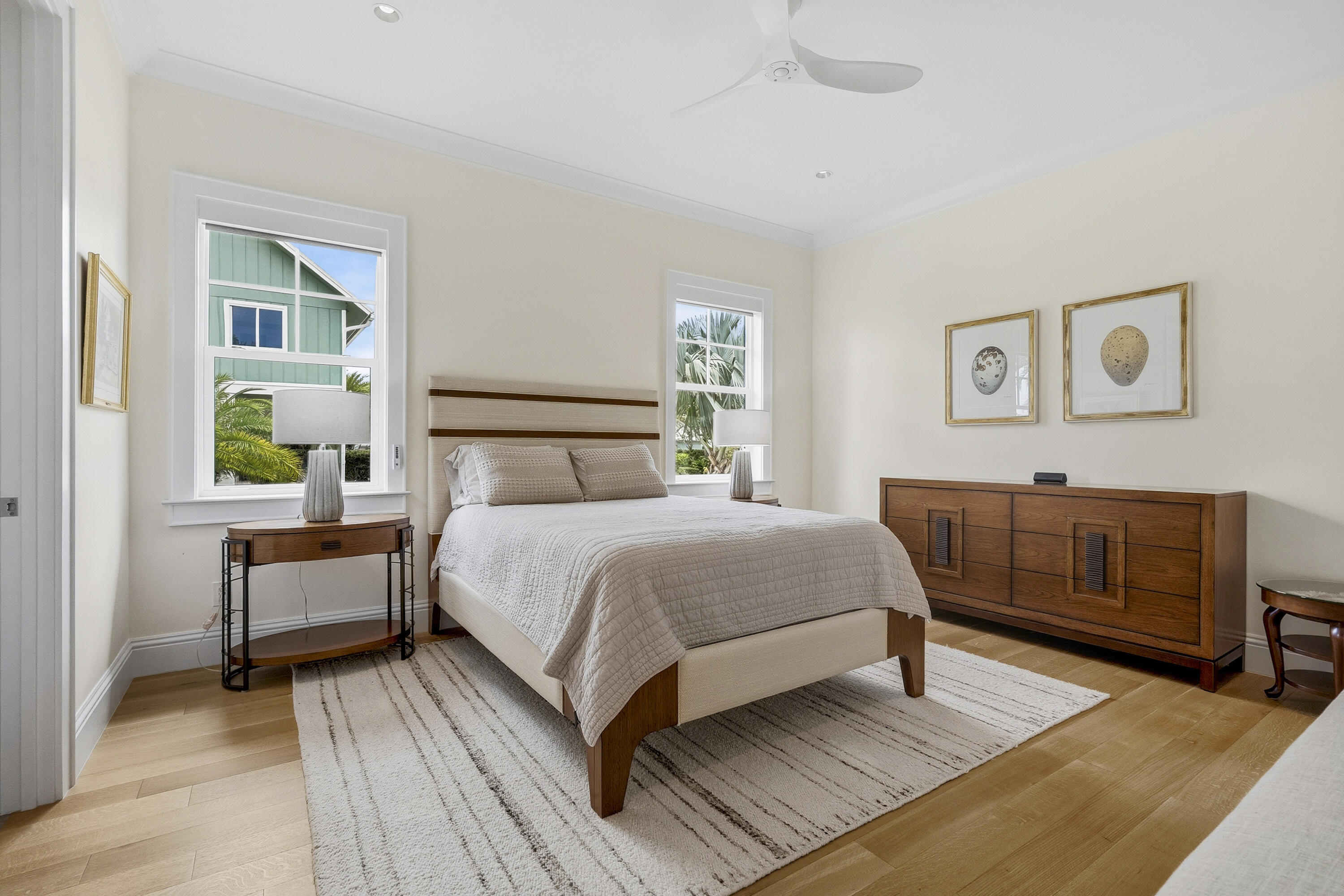 3973 Southeast Topsail Court Stuart, FL 34997 - Photo 18 of 38 a bedroom with a bed and a couch