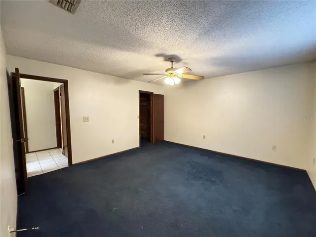 an empty room with a bathroom