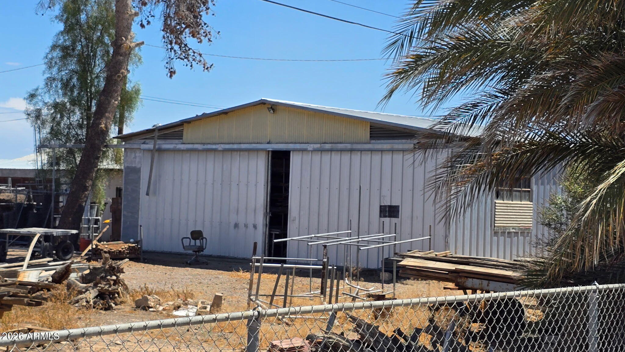 6803 South Miller Road Buckeye, AZ 85326 - Photo 41 of 50 a front view of a house with garden