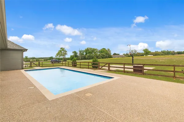 a view of a lake with a big yard