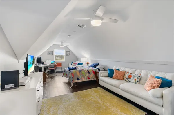 a living room with furniture and a couch