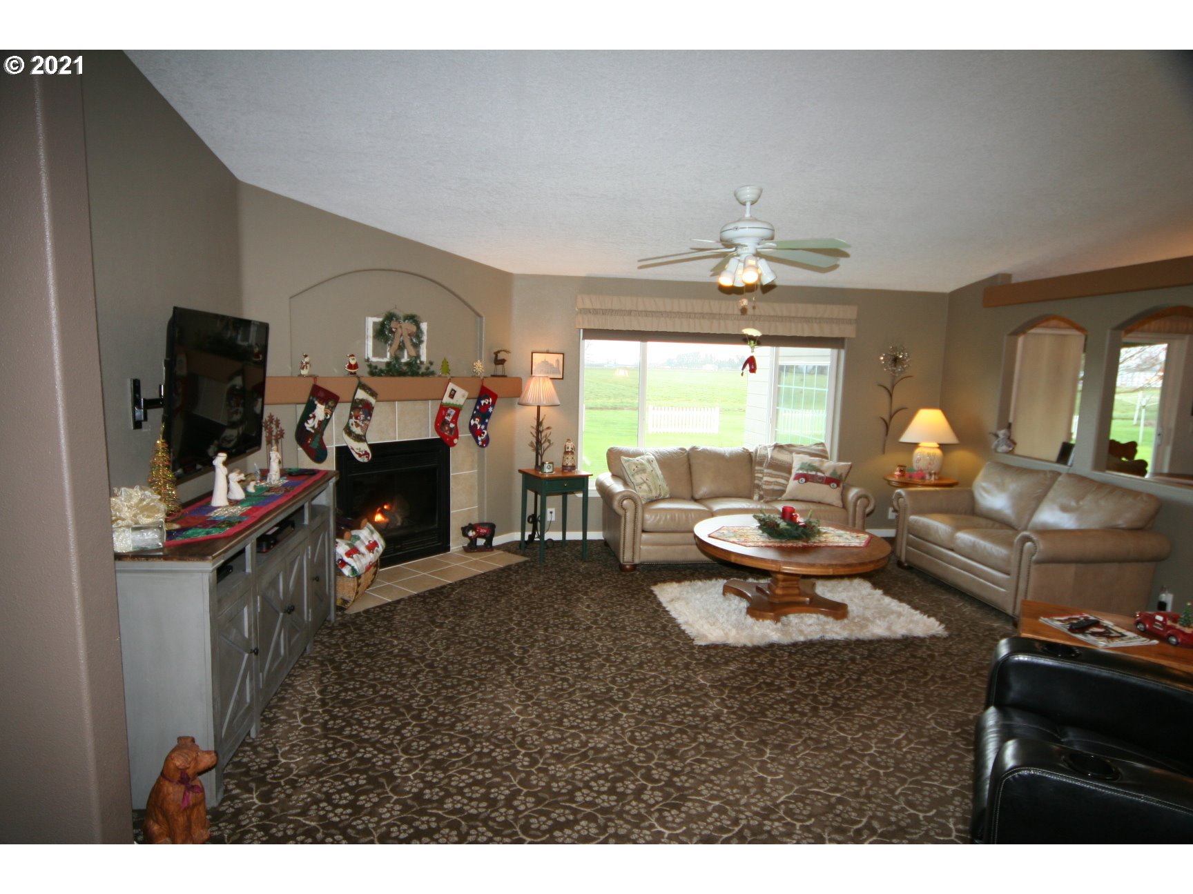 16775 Southeast Fairview Road Dayton, OR 97114 - Photo 3 of 24 a living room with furniture and a fireplace